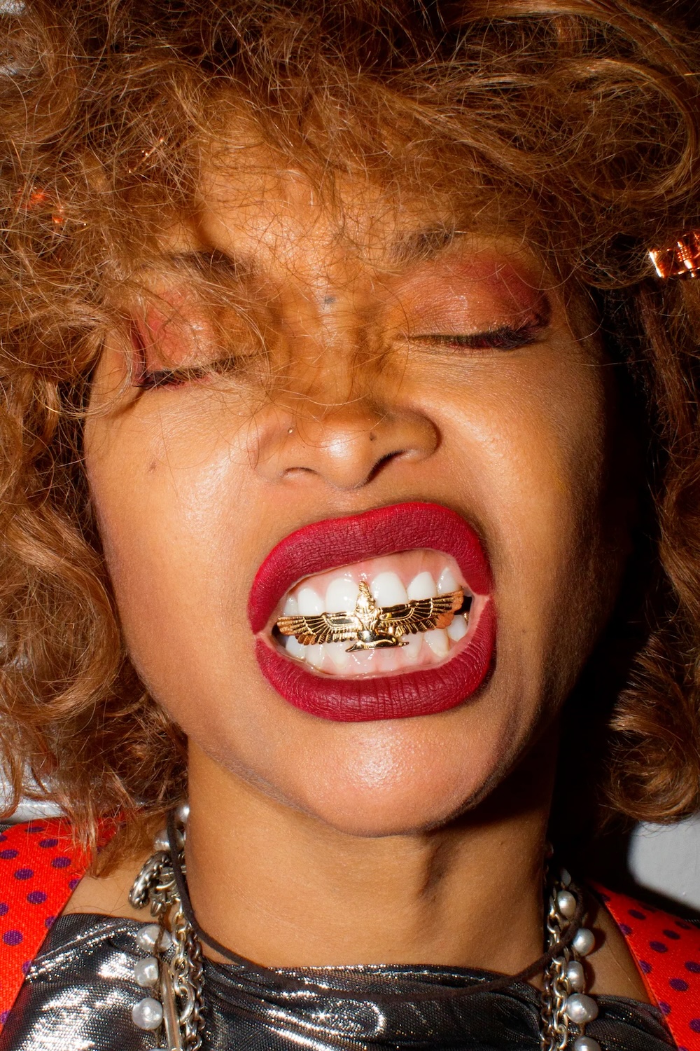 Erykah Badu. Grills by @LillianShalom Photographed by Tony Krash, courtesy of Vogue